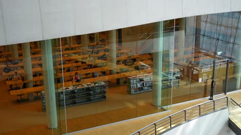 Static-shot-of-people-studying-inside-Black-Diamond,-Copenhagen-Royal-Library