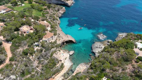 Mallorca:-Aerial-View-Of-Resort-Town-Cala-Liombards-On-Majorca-Island,-Spain,-Europe-|-Sky-Lower-to-Island