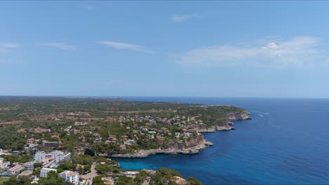Mallorca:-Aerial-View-Of-Resort-Town-Cala-Liombards-On-Majorca-Island,-Spain,-Europe-|-Mansions-on-Countryside-Coast