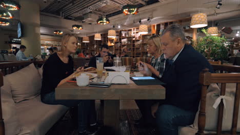 Taking-clip-of-family-dinner-in-the-restaurant