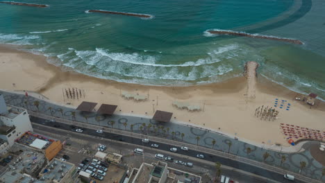 Timelapse-of-waves-car-and-people-traffic-on-sea-front-Tel-Aviv-Israel