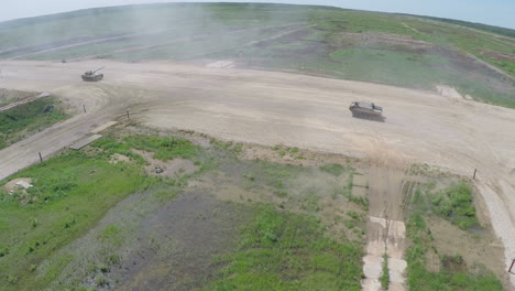 Aerial-shot-of-military-vehicles-on-shooting-ground