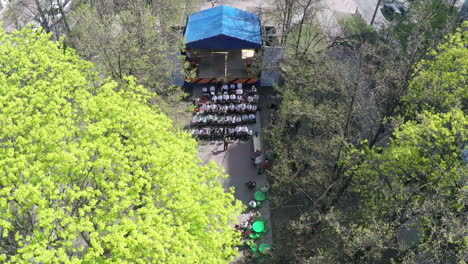 Children-orchestra-in-city-alley-aerial-view