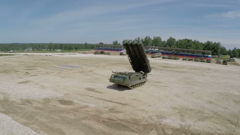 Flying-over-missile-launcher-and-tanks-on-shooting-ground