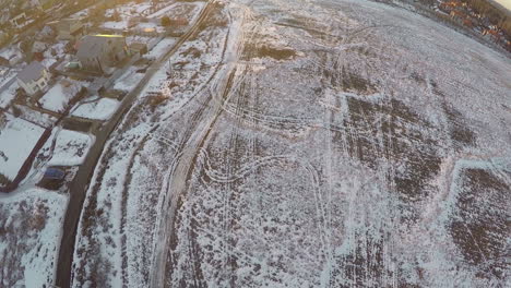 Flying-over-countryside-with-snowy-fields-Russia