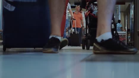 Travelling-People-with-Luggage-in-Airport