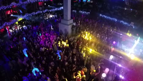 Singer-performing-in-crowded-club-aerial-view