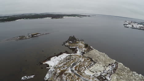 Bird-Eye-View-of-Old-Wood-House-by-Water