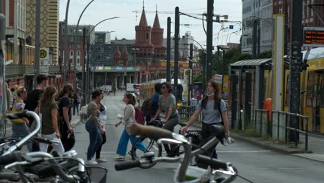 Quiet-Berlin-city-road-as-pedestrians-cross-in-both-directions
