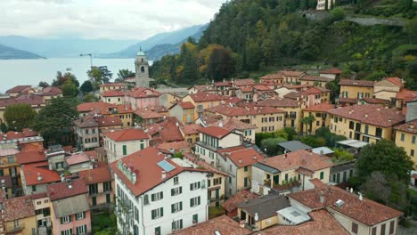 AERIAL:-boutique-lined-cobblestone-streets,-Italian-villas,-and-fragrant-gardens,-and-it’s-no-secret-why-Bellagio-is-known-as-the-Pearl-of-Lake-Como