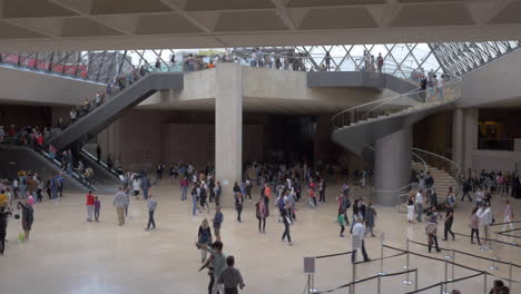 People-in-the-lobby-of-Louvre-Museum