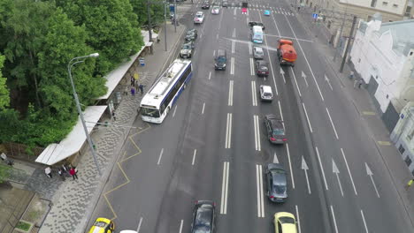 Aerial-view-of-city-motorway-with-public-transport-stop