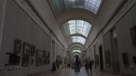 Louvre-hall-with-paintings-and-sculptures