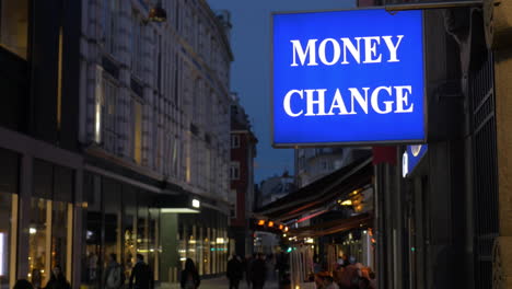 Money-Change-banner-in-night-street