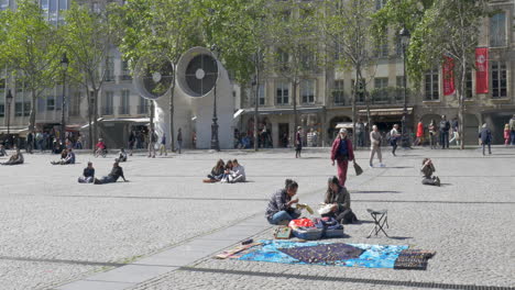 Walking-and-relaxing-people-on-square-of-Pompidou-Centre