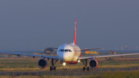 Airplane-making-a-turn-on-runway