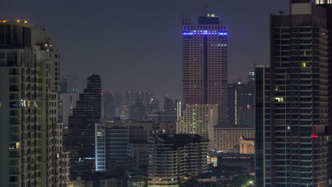 Zeitraffer-Blinkender-Fensterlichter-In-Der-Nacht-Von-Bangkok,-Thailand