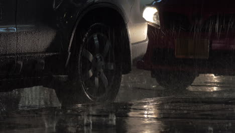 Parked-cars-under-the-rain-at-night