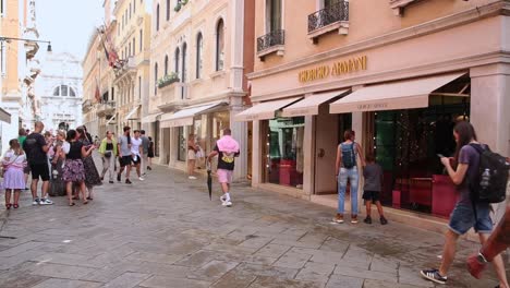 High-fashion-brand-Armani-shop-entrance,-popular-luxury-boutique,-Venice,-Italy