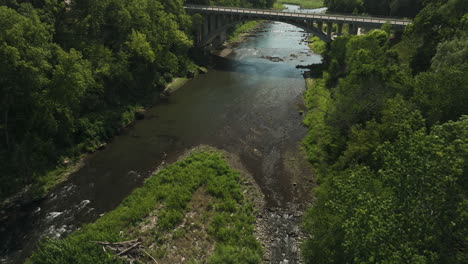 Aerial-View-Of-Zumbro-River-With-Arch-Bridge-Revealed