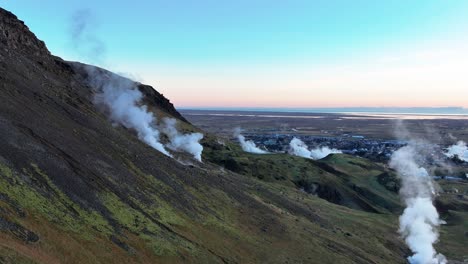 Steam-Rising-From-Mudpots-At-The-Geothermal-Area-In-Hverir,-Iceland