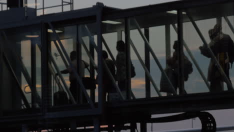 Group-of-people-walking-through-the-overhead-pedestrian-crossing-Hong-Kong-China