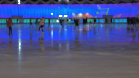 People-on-skating-rink-at-night