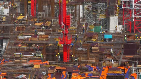 Vista-Del-área-De-Construcción-Con-Constructores-En-El-Trabajo-Kuala-Lumpur-Malasia