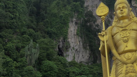 Seen-green-mountains-and-statue-of-Murugan-at-Batu-Caves
