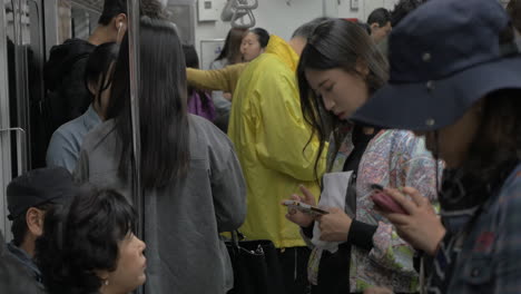 Korean-people-traveling-in-underground-Seoul-South-Korea