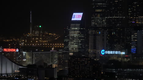 Evening-panorama-of-night-city-with-skyscrapers-advertising-signs-and-buildings