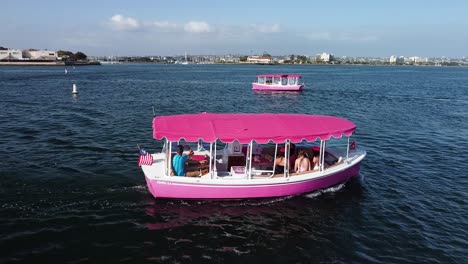 aerial-view-of-a-pink-Duffy-in-san-diego-bay