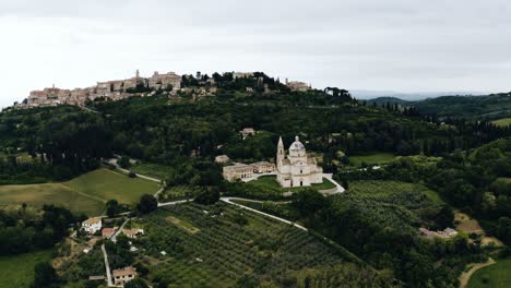 Wide-aerial-view-of-Italy's-countryside-prominently-featuring-the-Sanctuary-of-the-Madonna