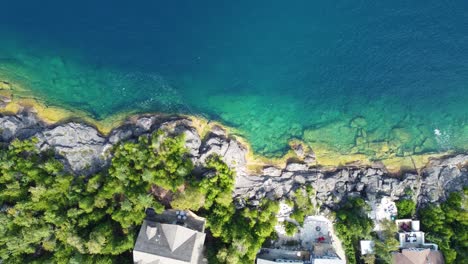 Above-View-Of-Villas-At-The-Rocky-Shore-Of-Georgian-Bay-In-Ontario,-Canada