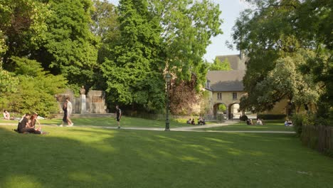 People-Relaxing-At-La-Cambre-Abbey-In-Brussels,-Belgium---wide-shot