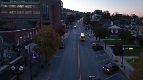 Dawn-in-small-town-America-main-street-with-a-school-bus-and-historic-buildings