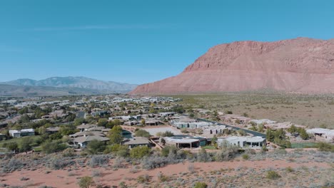 Ivins,-Utah-aerial-view-of-a-gated-community-beneath-the-red-sandstone-cliffs