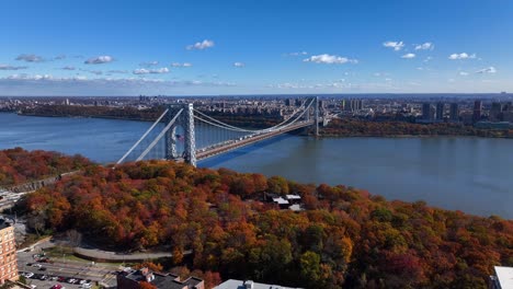 An-aerial-view-high-over-Fort-Lee,-New-Jersey-on-a-sunny-day-in-autumn