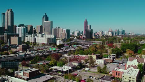Atlanta-skyline-with-bustling-city-traffic,-Georgia,-USA