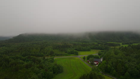 Foggy-Clouds-Above-Lush-Tree-Forest-On-The-West-Coast-Of-Norway
