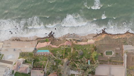 Wide-static-aerial-footage-of-a-beach-resort-on-the-coast-of-The-Gambia