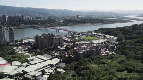 Aerial-View-of-Guandu-Bridge-in-Sunny-Taipei,-Taiwan