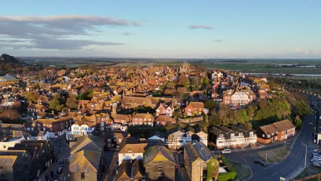 Sunset-,Rye-quaint-town-in-Sussex-England-pull-back-drone-aerial-reverse-reveal