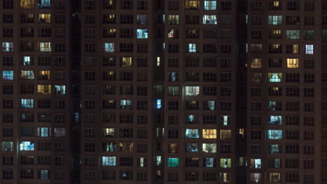 Timelapse-of-high-rise-apartment-block-at-night