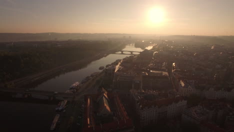 Flying-over-Prague-and-Vltava-river-at-sunset