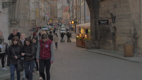 Prague-street-with-Lesser-Town-Towers-gate