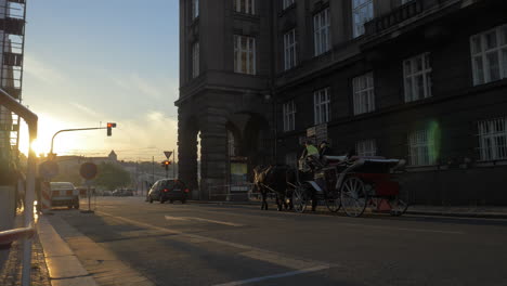 Prague-street-with-car-and-horse-carriage
