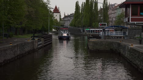 Timelapse-of-touristic-ship-on-sluicing-in-Prague-Czech-Republic