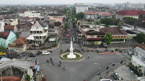 Timelapse-or-Hyperlapse-aerial-view-of-Tugu-Jogja-or-Yogyakarta-Monument,-Indonesia