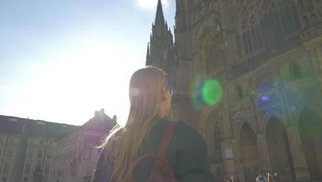 Woman-tourist-and-St-Vitus-Cathedral-in-Prague